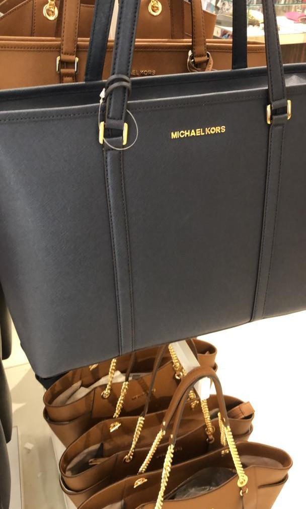 Michael kors bag that fits laptop clearance
