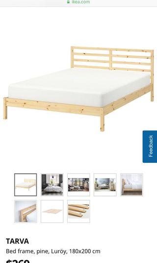 IKEA queen bed frame, mattress included.