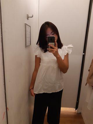 White ruffle top
