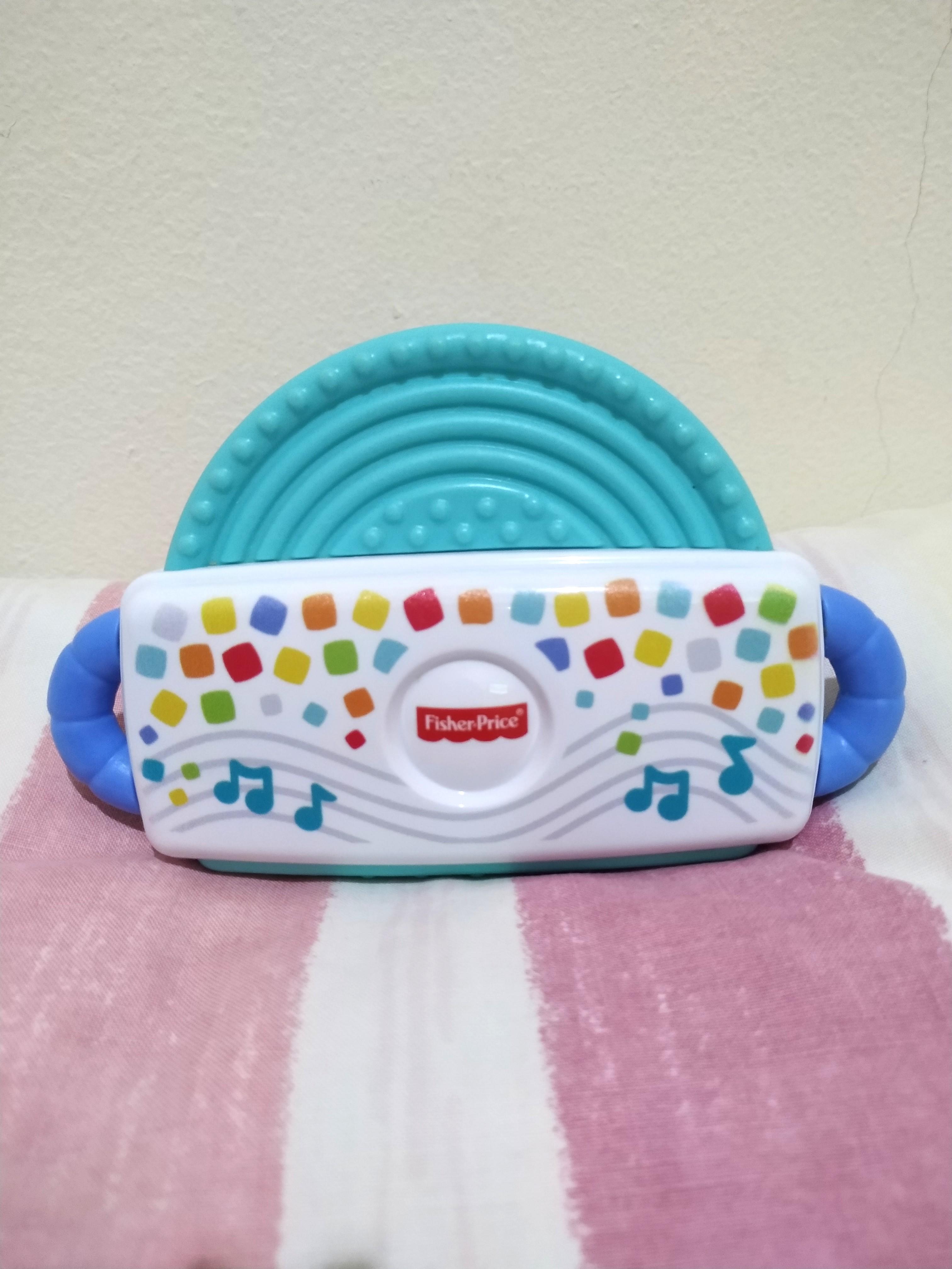 Fisher price harmonica shop teether