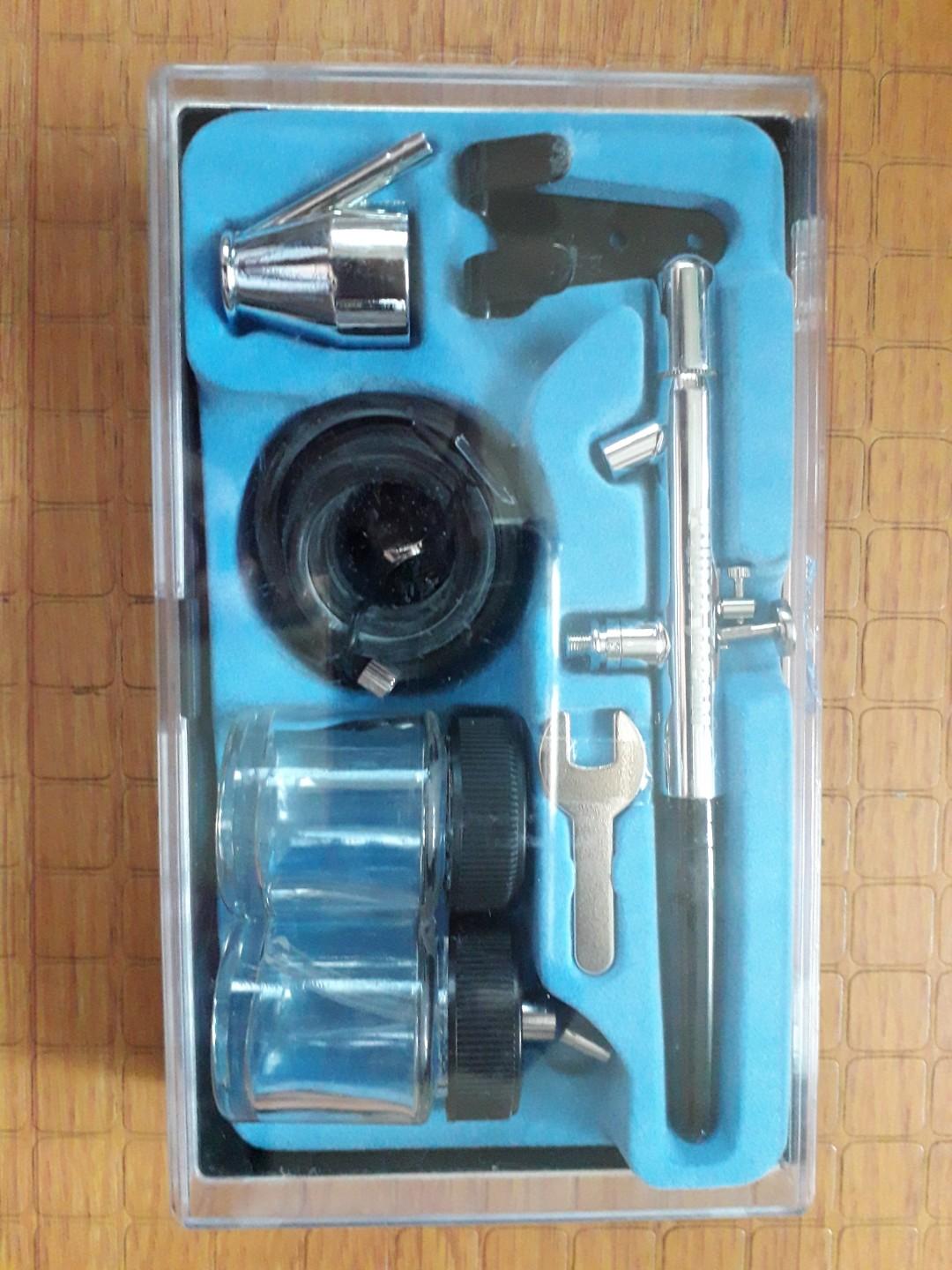 Fujima Airbrush Kit (no box) (Category: Craft Supplies & Tools) located in Manila. Submitted by raineshop77 (Listing ID 237360505, Image 1). Description: Fujima Airbrush Kit Brand new No Box Includes Air Brush Kit Trigger Tail Cover Air Hose Spanner Jar Cover with Nozzle Glass Jars Air Hose Paint Cup Spray Gun Holder Protective Cup, 1/4 BSP Compressor Air Hose Adapter P2.0 bar 0.35 mm 150mm long Brass Material.
