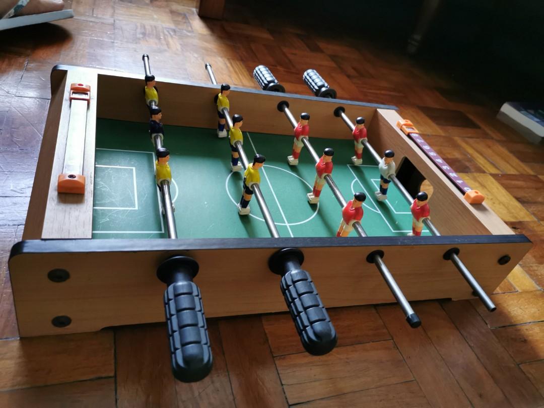 Mini Foosball table (Category: Board Games & Puzzles) located in Manila. Submitted by juneuy (Listing ID 237488534, Image 3). Description: Pre loved Foos Ball table for kids (and adult as well). 20x12.5 inch..