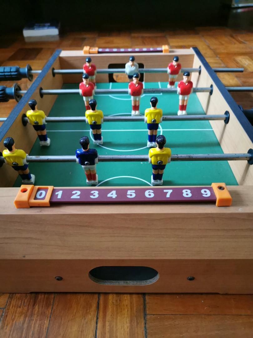 Mini Foosball table (Category: Board Games & Puzzles) located in Manila. Submitted by juneuy (Listing ID 237488534, Image 2). Description: Pre loved Foos Ball table for kids (and adult as well). 20x12.5 inch..