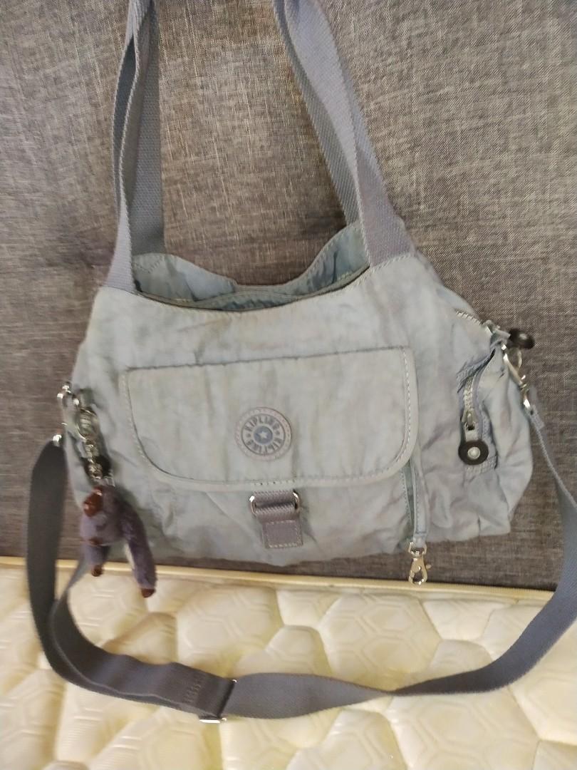 Authentic kipling (Category: Purses & Pouches) located in Bulacan. Submitted by shoppeeloved (Listing ID 237669161, Image 1). Description: This bag has many compartments, medium size 10 inches tall and 16 inches wide, need wash With sling #freejuly.
