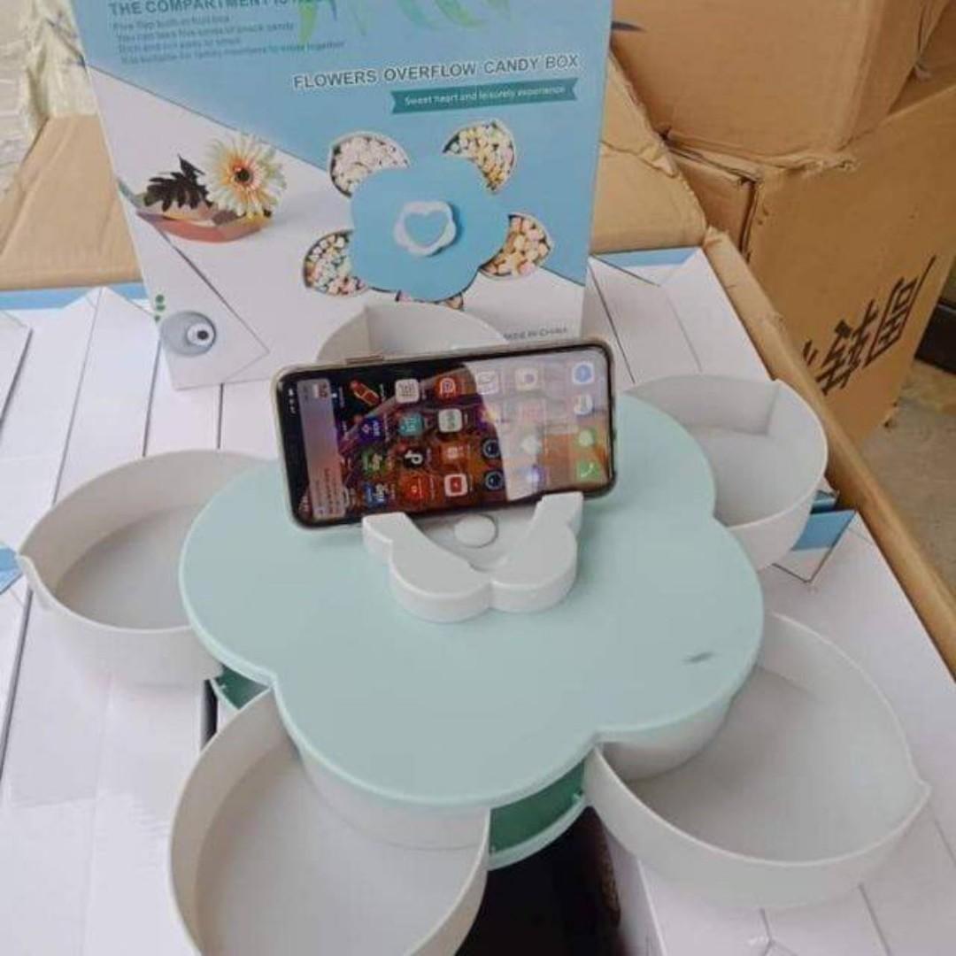 SNACK TRAY ROTATING CANDY BOX WITH PHONE HOLDER (Category: Towels, Napkins & Holders) located in Manila. Submitted by christimjose09 (Listing ID 237757428, Image 3). Description: Product details: ✔️Designed with separate five grid. Easily store dried fruit, nuts, candy, chocolate and other snacks by category. ✔️Unique petal shape makes more artistic. It can be used for storing small snacks, nuts and other small items such as jewelry and cosmetics