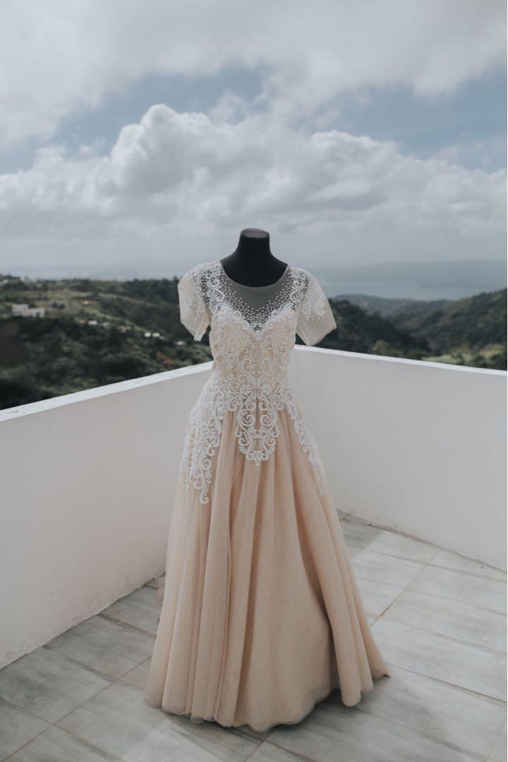 Wedding Gown L to XL (Category: Evening dresses & gowns) located in Paranaque City. Submitted by jnrnd (Listing ID 237665160, Image 3). Description: Wedding gown color: Beige/Nude Beaded already in front with inner corset to shape Bust 35-38 Waist 34-35 as is. no veil no box not yet dry cleaned. preferred pick up so you can fit the gown. #winsunniesface.
