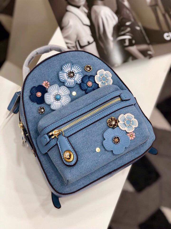 Authentic coach denim tea Rose backpack, Women's Fashion, Bags & Wallets,  Purses & Pouches on Carousell