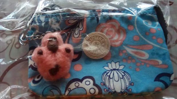 Pouch Kipling (authentic) (Category: Purses & Pouches) located in Singapore. Submitted by wahaha12 (Listing ID 237844969, Image 1). Description: Price negotiable. Brand new.
