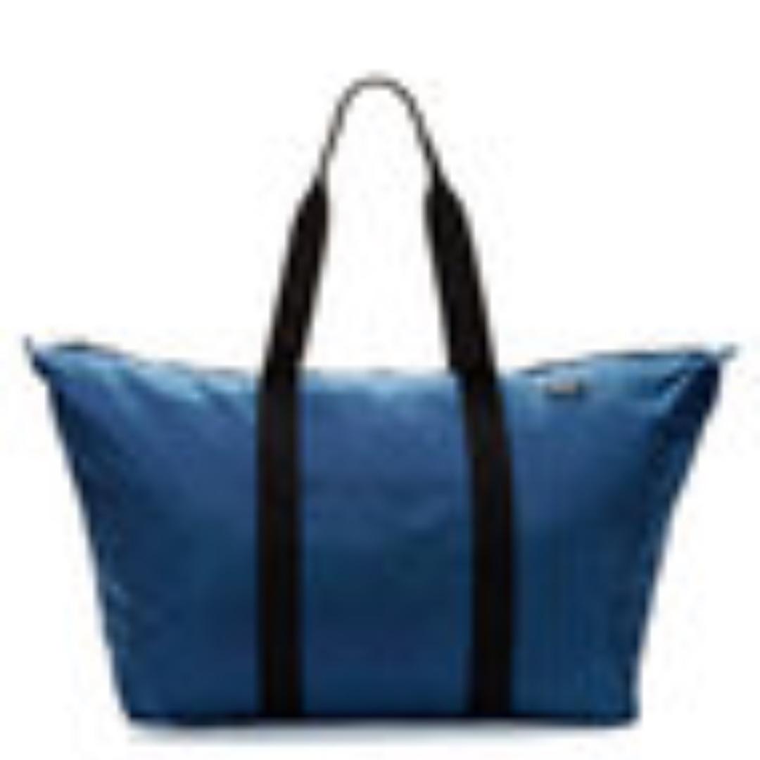 jack spade packable/foldable travel gym bag navy (Category: Backpacks) located in Makati City. Submitted by theangeldoesselfcare (Listing ID 238059371, Image 1). Description: Jack Spade Collapsible duffle Original Price US$145 · Nylon · Canvas top handles · Pouch used to store duffle transports into interior pocket reinforced with snaps · Logo patch · Zip top closure Measurements: Body length 28",height 16", width 9" Material: nylon, canvas Care: