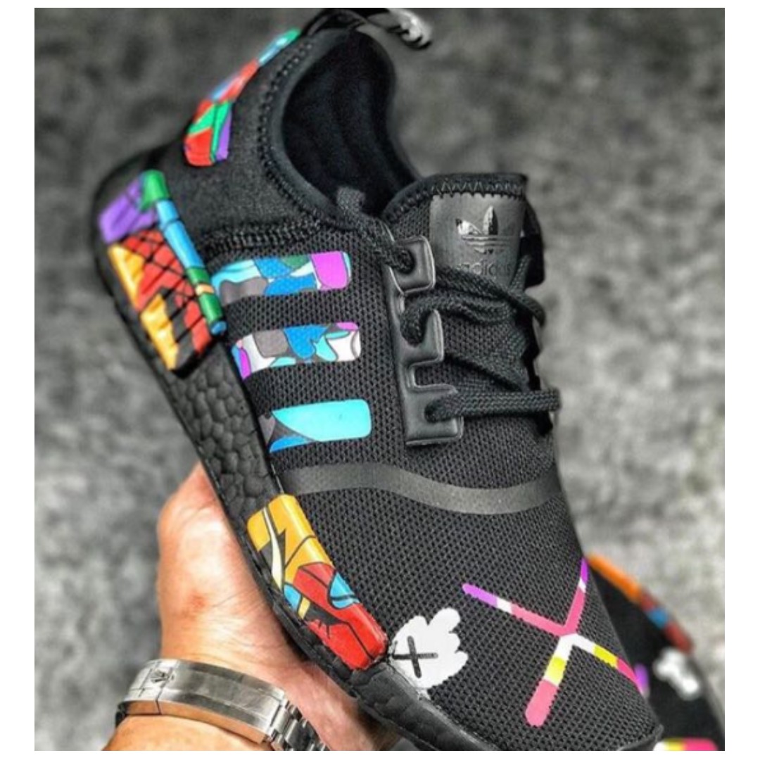 KAWS X NMD R1 Adidas Limited Edition, Sports Equipment, Sports & Games, Racket Ball Sports on Carousell