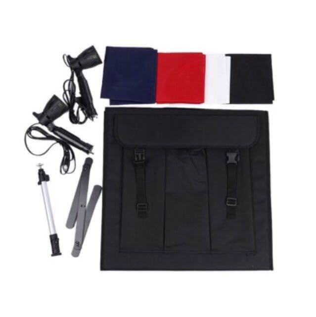 Photo Studio Square Light Tent Kit (Category: Lighting & Studio Equipment) located in Manila. Submitted by jelly0492 (Listing ID 238028816, Image 2). Description: What’s included: • 1x 40cm/ 16" square light tent • 2x 50W Halogen Lamps with stand (EV plug) • 1x Rotatable copy stand • 4x Backdrops (red, black, blue, white) ✔️no issue ✔️not damaged ✔️good working condition ✔️price negotiable RSF: Bought this at LAZADA but made wrong purchase. Just 