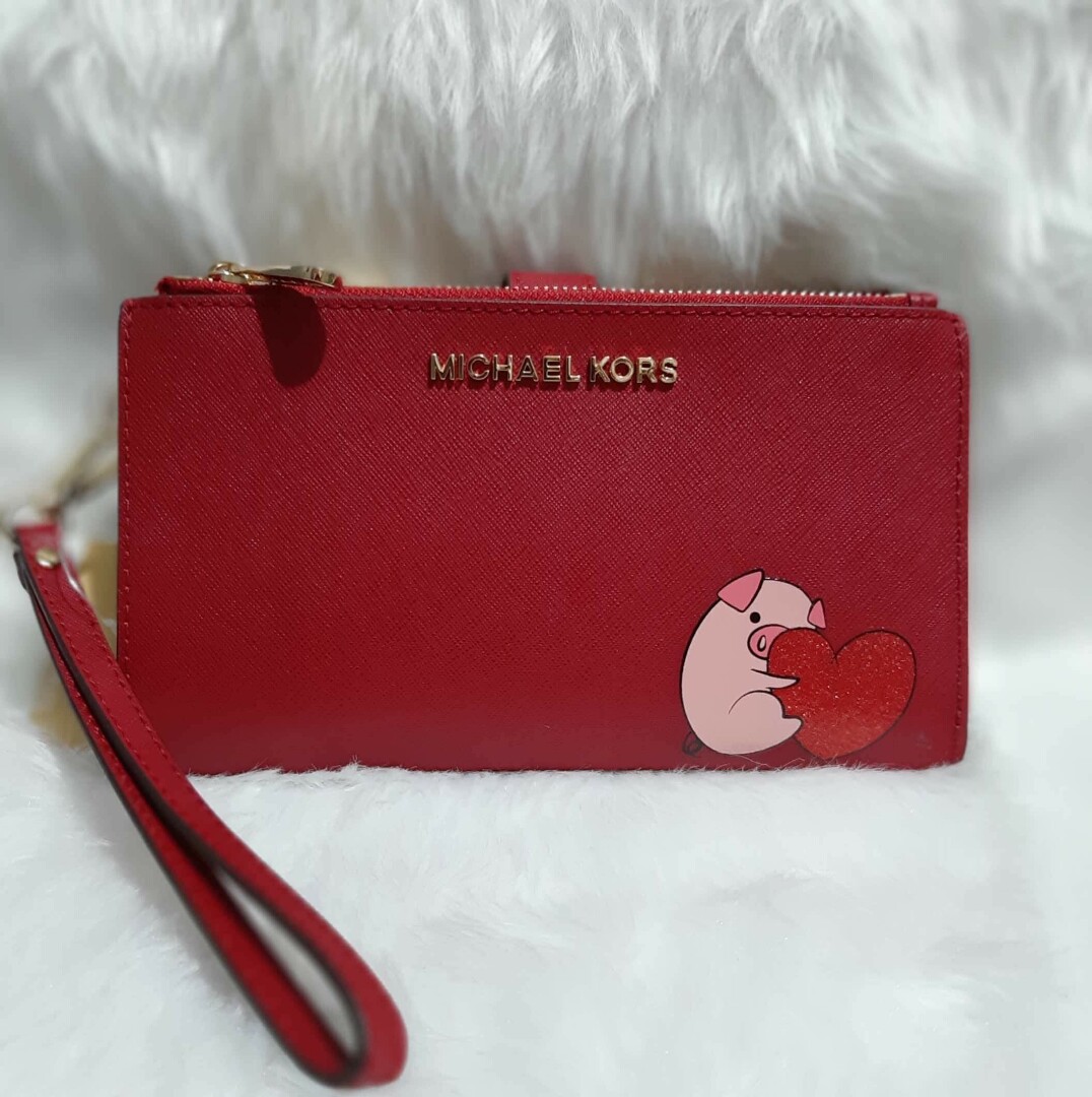Michael Kors Giftables Chinese New Year Pig Double Zip Wristlet, Women's  Fashion, Bags & Wallets, Wallets & Card holders on Carousell