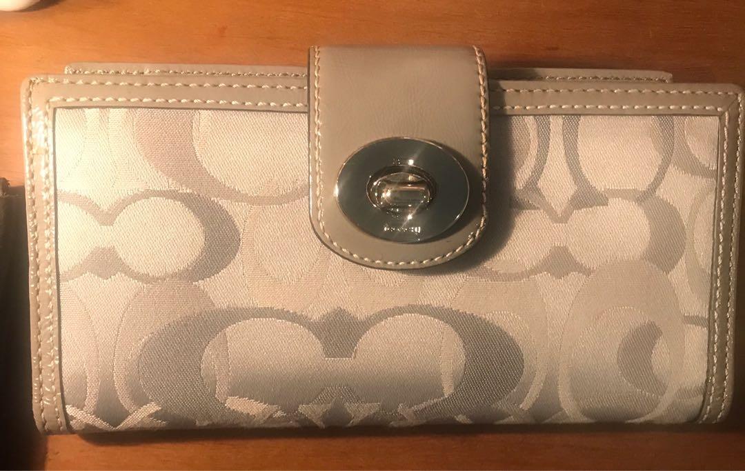 Original Coach wallet with checkbook case (Category: Luxury Bags & Wallets) located in Paranaque City. Submitted by cha_ml (Listing ID 238177498, Image 1). Description: Oroginal Coach wallet with small stains.
