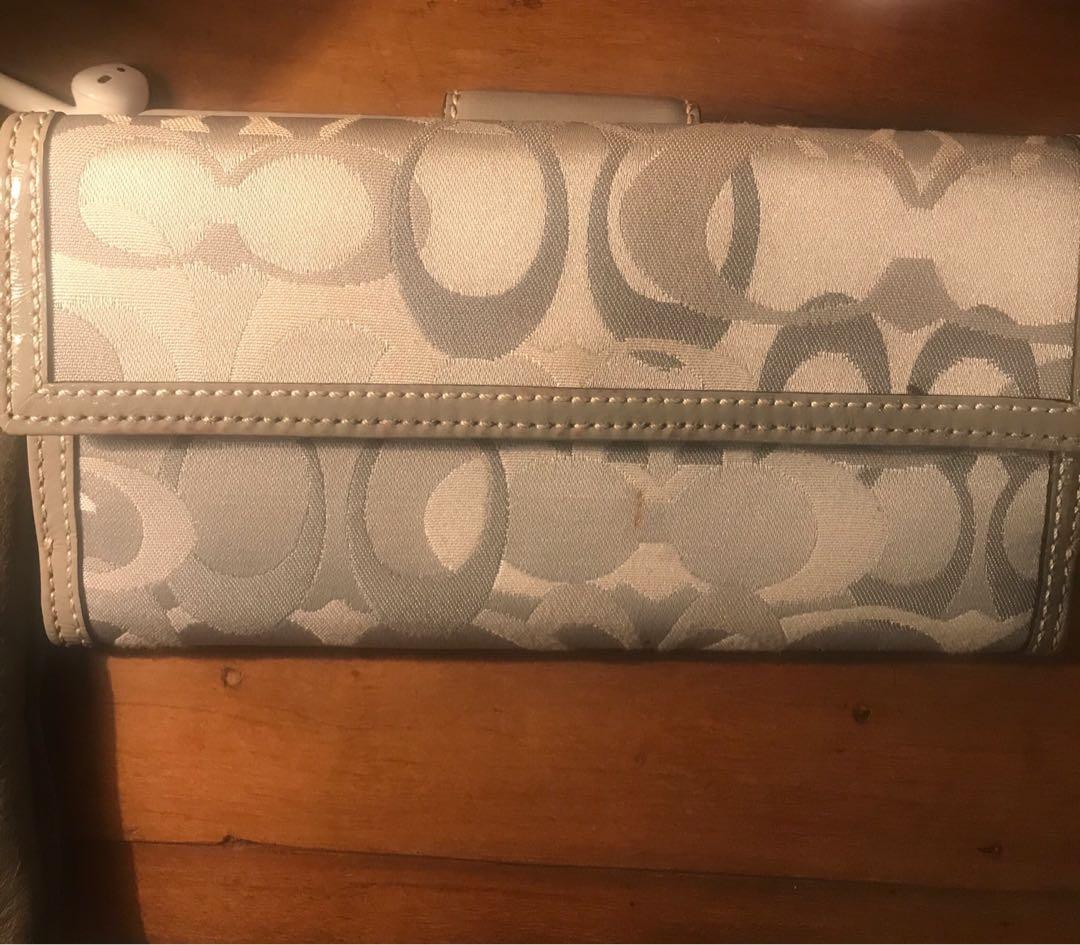 Original Coach wallet with checkbook case (Category: Luxury Bags & Wallets) located in Paranaque City. Submitted by cha_ml (Listing ID 238177498, Image 2). Description: Oroginal Coach wallet with small stains.