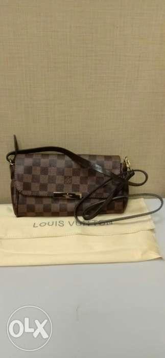 Louis Vuitton Clutch Bag (Category: Luxury Bags & Wallets) located in Manila. Submitted by bing-su (Listing ID 238482493, Image 3). Description: This Louis Vuitton Clutch Bag is very elegant and handy. You can use this when you go out for an event or social functions. Also in ordinary walk you can use this as well. Offer for this is limited so grab this product now! Text or call the number posted here. Thank you and Happy Shopping!.