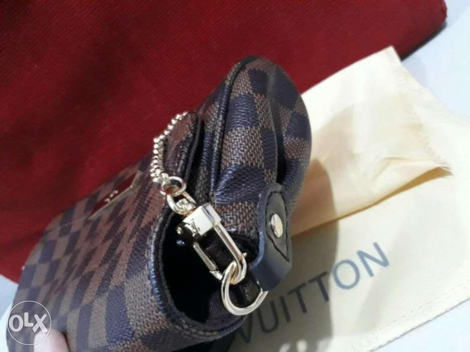 Louis Vuitton Clutch Bag (Category: Luxury Bags & Wallets) located in Manila. Submitted by bing-su (Listing ID 238482493, Image 2). Description: This Louis Vuitton Clutch Bag is very elegant and handy. You can use this when you go out for an event or social functions. Also in ordinary walk you can use this as well. Offer for this is limited so grab this product now! Text or call the number posted here. Thank you and Happy Shopping!.