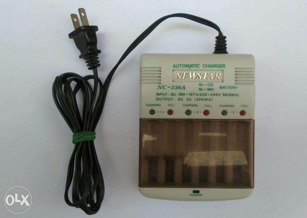 Automatic Battery Charger (Category: Chargers) located in Manila. Submitted by magicgerry (Listing ID 238502666, Image 3). Description: Automatic Battery Charger for AA or AAA, Ni-CD or Ni-MH (13w) (P705.00) > Input: AC 100-127v/220-240v 50/60Hz > Output: DC 3V (3 Pairs) > Battery Type: AA/500mAh - 2-4 hrs AA/700mAh - 5-7 hrs AA/900mAh - 6-8 hrs AA/1200mAh - 8-10 hrs AA/1800mAh - 17-19 hrs AAA/200mAh - 2-4 hrs AAA/270mAh - 3-5 hrs AAa/3800mAh - 5