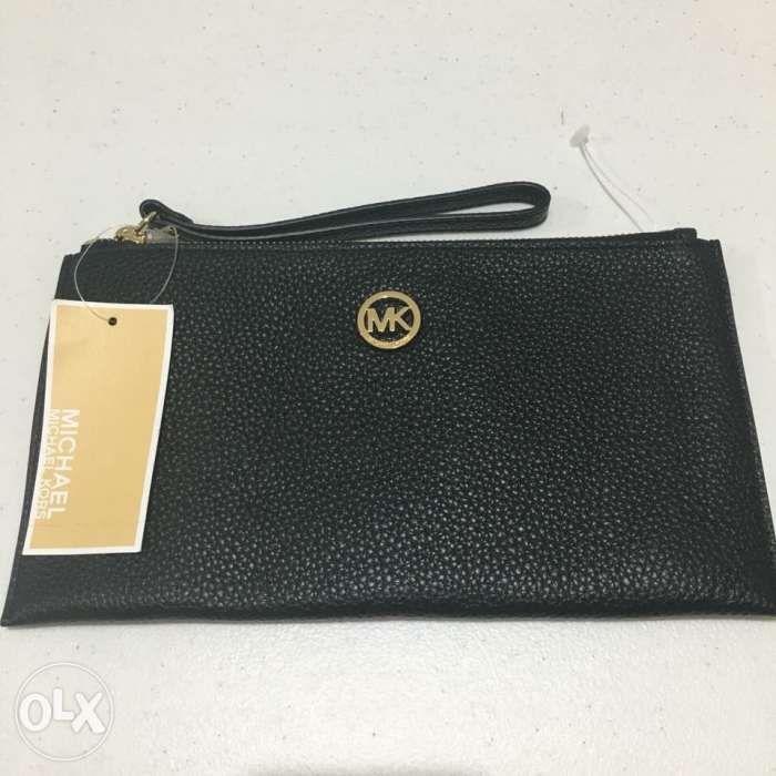 mk fulton large zip clutch