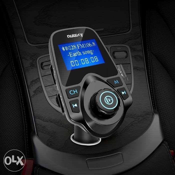 Nulaxy Bluetooth FM Transmitter Car Kit with Micro SD & USB (Category: Portable Audio Accessories) located in Manila. Submitted by techsmartph (Listing ID 238524794, Image 2). Description: -Two USB ports: one designed for charging and the other for reading USB files; -Stylish Design: Large LED display screen not only can show current voltage of the storage battery of your car but also the name of songs or caller ID; -AUX In and Out: Supports AUX 