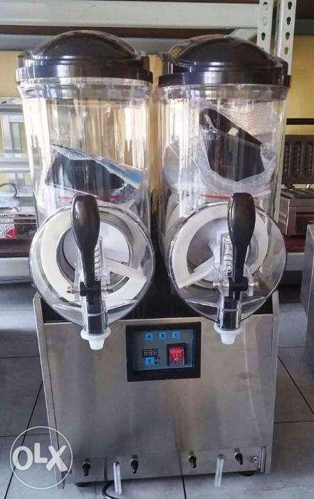 Slush machine or Slurpy Machine (Category: Refrigerators and Freezers) located in Manila. Submitted by cosmicmachineries (Listing ID 238532634, Image 2). Description: SUMSTAR SLUSH MACHINE DOUBLE TUBS - Advanced electronic temperature control with a digital display that indicated the temperature of the beverages. - Frozen and liquid drinks 2 in 1 machine. - Very simple to program and run with touch pad display which also guides cleaning and preve