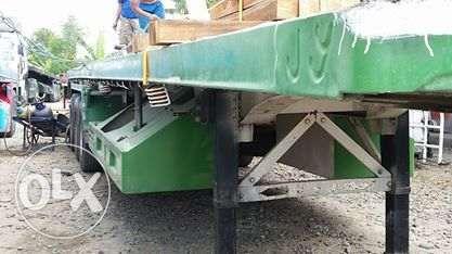 40ft trailer flatbed (Category: Construction & Building Materials) located in Meycauayan. Submitted by buboy.jam (Listing ID 238540610, Image 2). Description: For sale 42ft. trailer flatbed triple axle air brake ok electrical ok 12 pcs tires ok price: 700k 0-9-0-6-3-0-1-8-0-0-7.