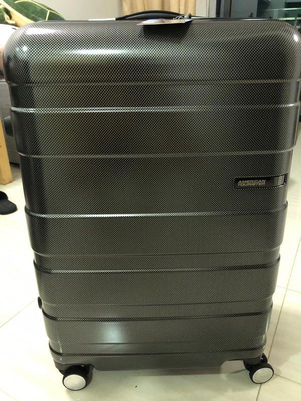 american tourister hs mv  deluxe spinner 69cm exp