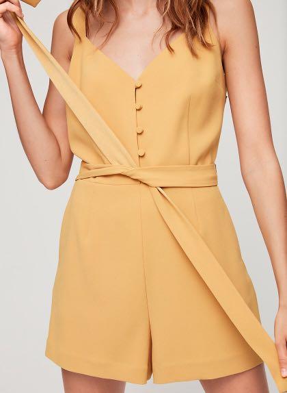 Aritzia Little Moon Petunia Romper in Cairo Gold size 4 Women s Fashion Clothes on Carousell