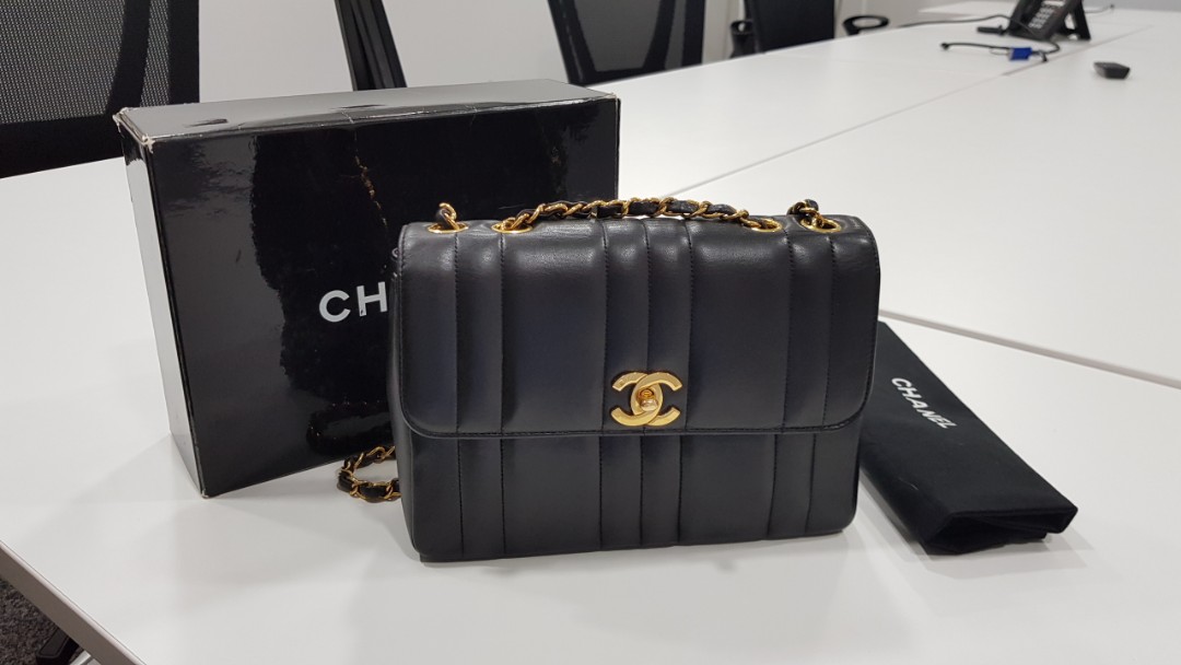 Authentic Chanel Vintage vertical quilts medium bag!, Luxury, Bags &  Wallets on Carousell