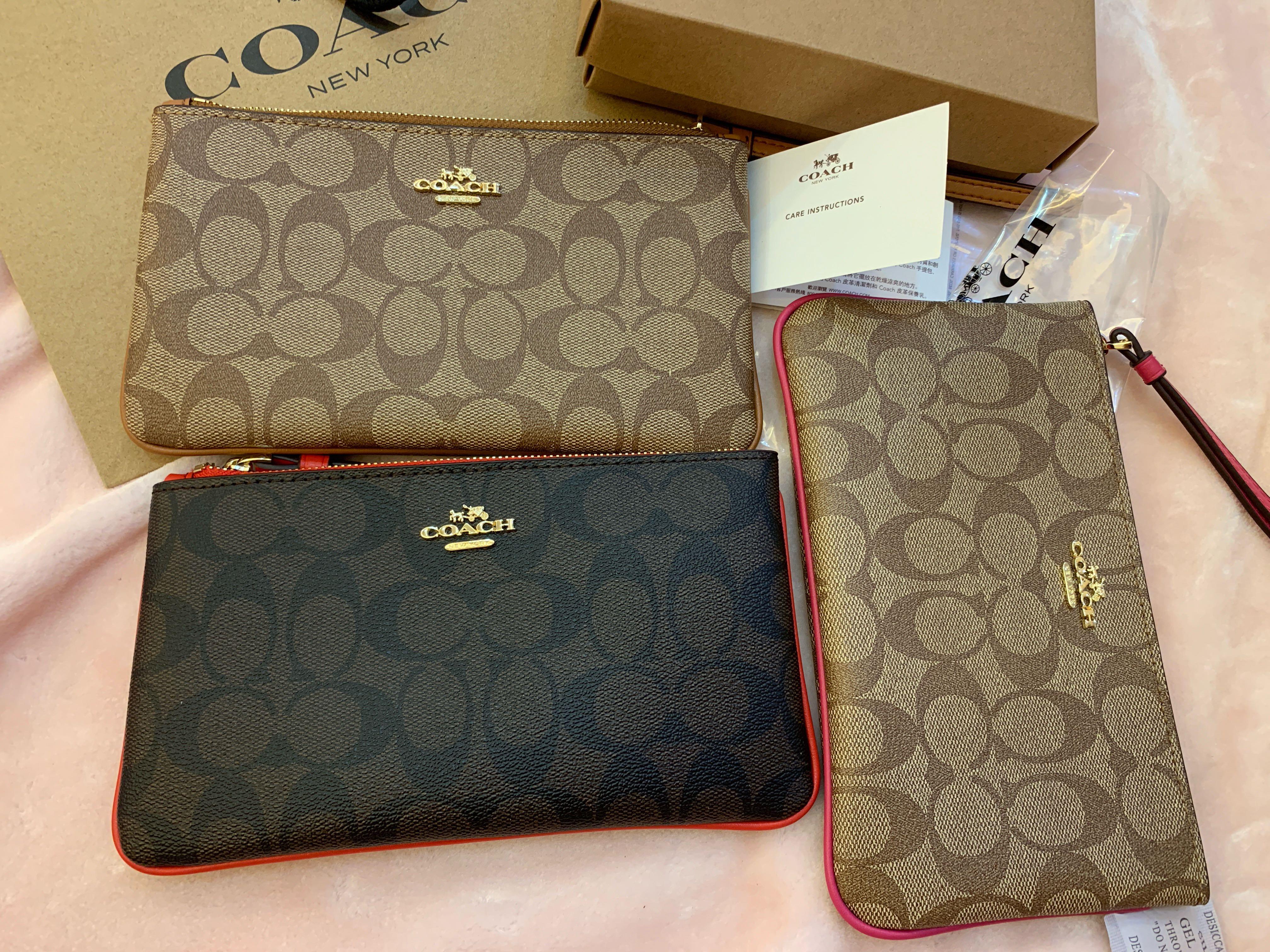 Coach pouch wallet price hot sale