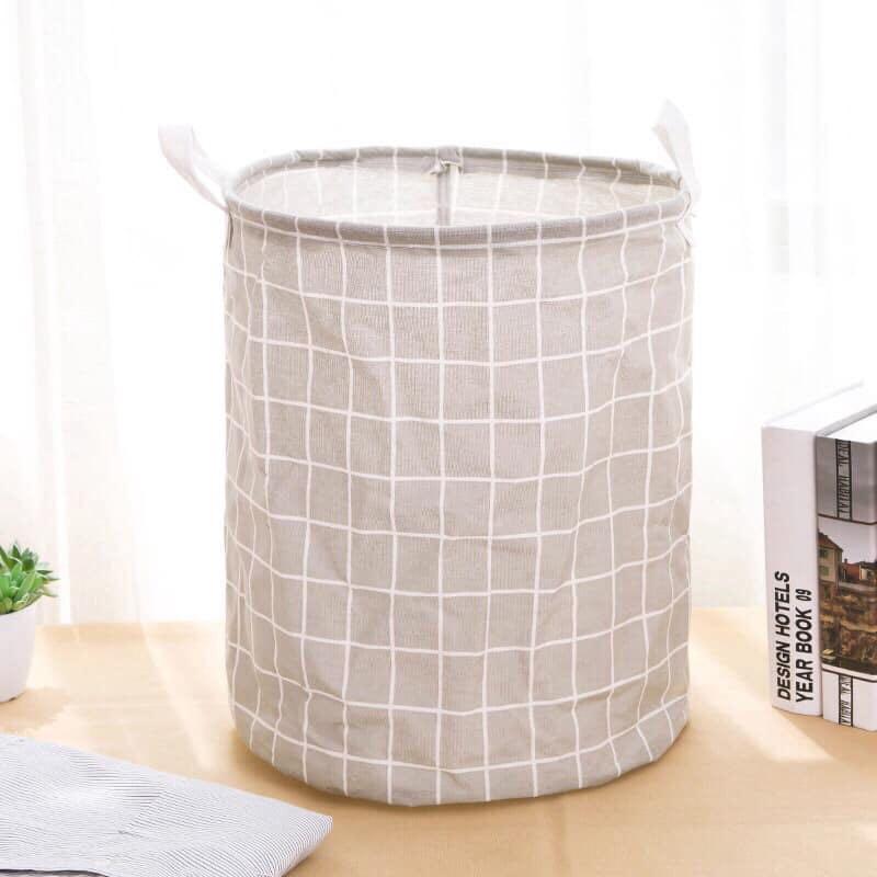 Foldable Laundry Basket (Category: Laundry Baskets) located in Taguig. Submitted by closetcompany (Listing ID 238344873, Image 3). Description: lc * Material : Nylon / Canvas * Colors : Black and Brown * Waterproof * Foldable * Can be store in Bathroom * 41 x 35 cm.