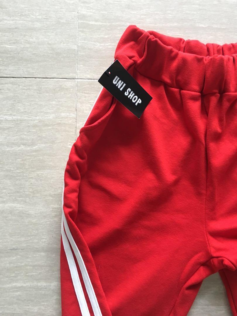 Red pants discount with white stripe