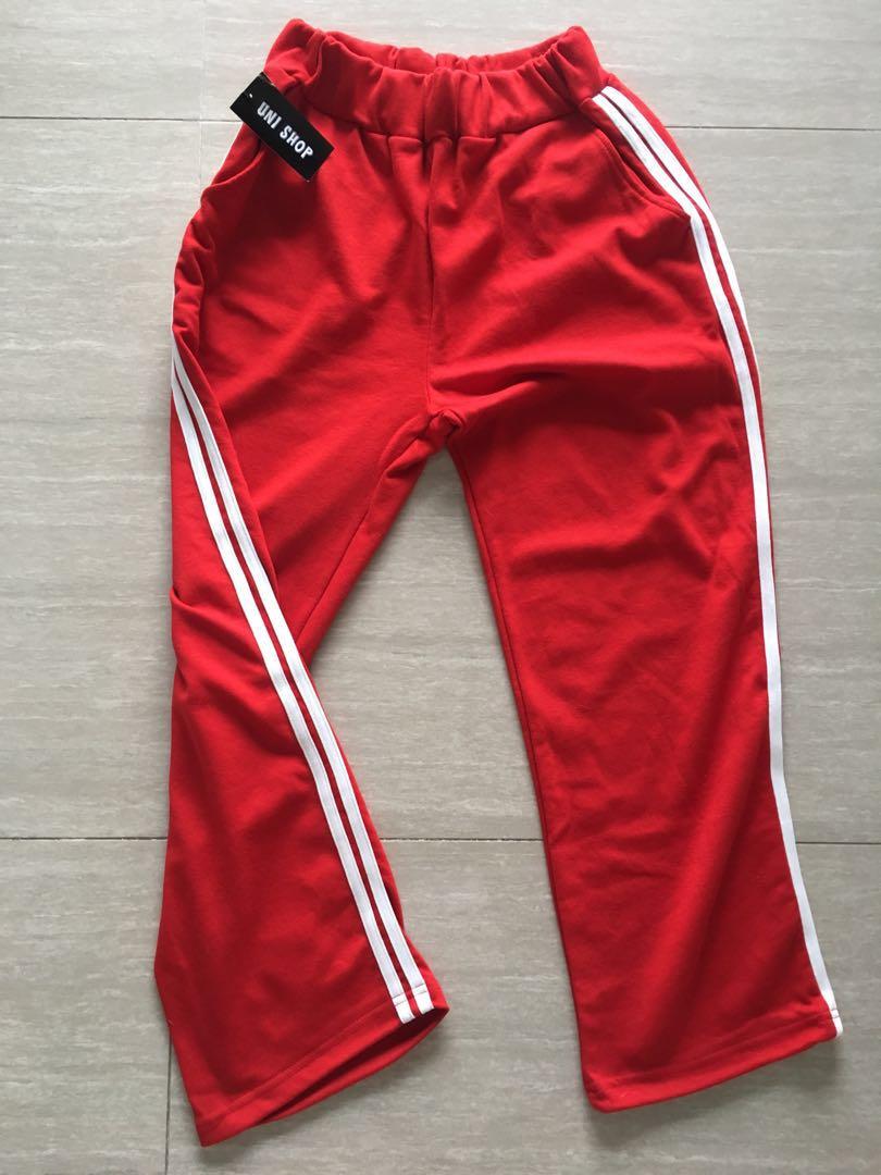 White track pants with red stripe on sale