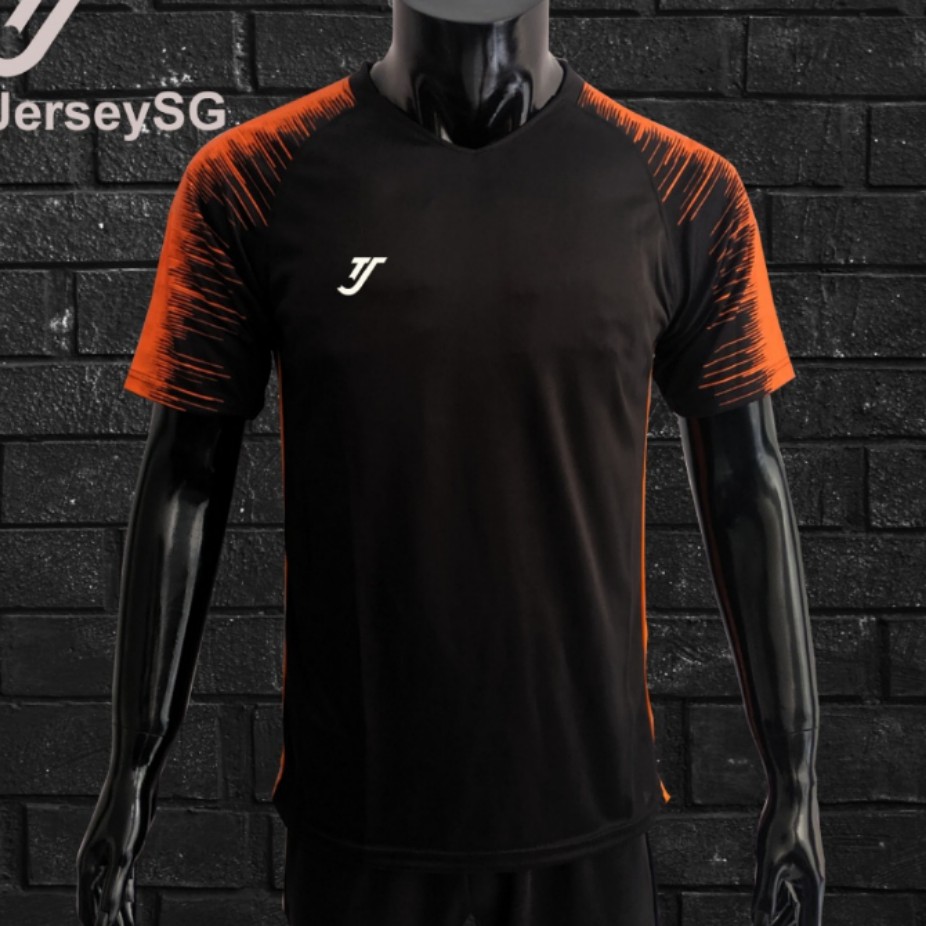 black and orange soccer jersey