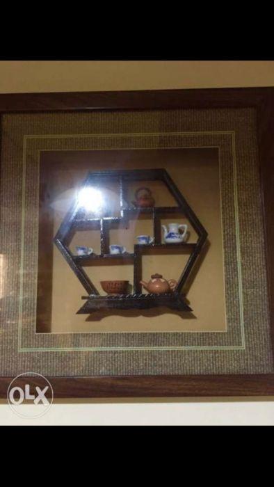 Antique Wall Decor Frame (Category: Frames & Pictures) located in Manila. Submitted by ubergoods (Listing ID 238552098, Image 3). Description: Antique Wall Decor with mini Ceramic vases inside 8 miniatures of Blue & white ceramic kettle cups and vases inside the frame Collectors item Bought in Beijing China Authentic Nice Wall Display 4,000 per pc. Should be bought in pair Pls call. No texts Sure buyer only Slightly Negotiable This is Very Nice !