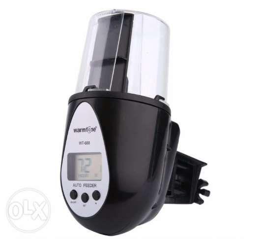 Automatic Fish Feeder WT688 (Category: Homes & Other Pet Accessories) located in Manila. Submitted by agglobal (Listing ID 238555290, Image 2). Description: - Capable of four setting options: (1) twice a day, (2) once a day, (3) once every two days, and (4) once every four days - It has Ultra anti-electromagnetic interference protection to avoid unprogrammed rotating damage. - Four mounting positions possible. - Uses 2 AA batteries..