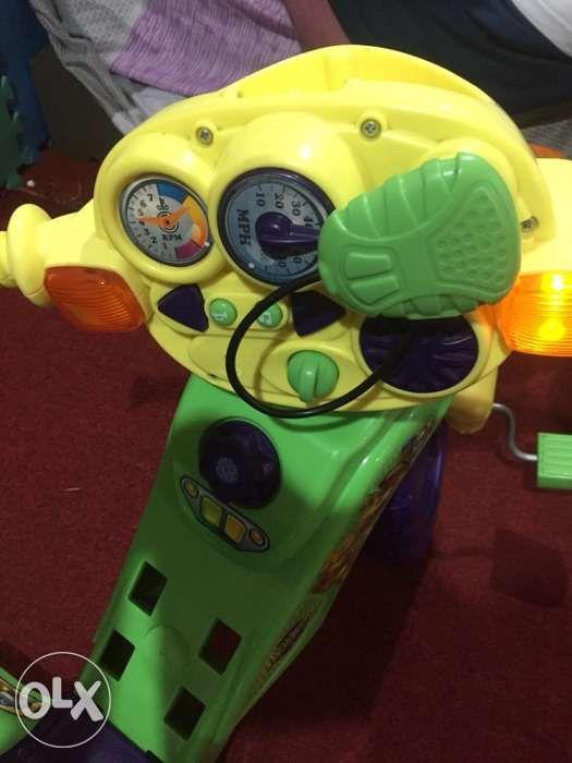 fisher price push along trike