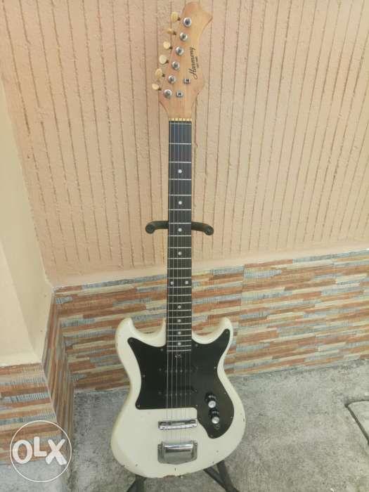 Harmony 70s Guitar USA (Category: Musical Instruments) located in Manila. Submitted by kinganalog (Listing ID 238567268, Image 2). Description: Harmony Guitar 70s made in USA in very good condition, all stock. Dents on body and oxidation on hard ware. Comes with generic soft case. Sale or swap to working Turntable, Amp or speaker. Lp or vinyl, cds or cassette tapes. Check out my facebook page Roots Analog..