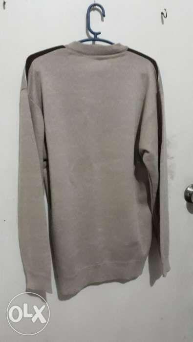 Knitted Sweater (Category: Coats, Jackets and Outerwear) located in Las Pinas. Submitted by hermogenesjr.p (Listing ID 238589264, Image 2). Description: This listing is hosted on Carousell on behalf of OLX Philippines. Knitted sweater includes a scarf Good for layering clothing for cold climates almost like new. used only once meetup southmall or robinsonson galleria 09064685377.