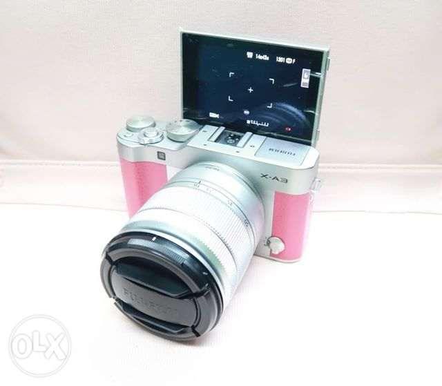 pink camera with flip screen