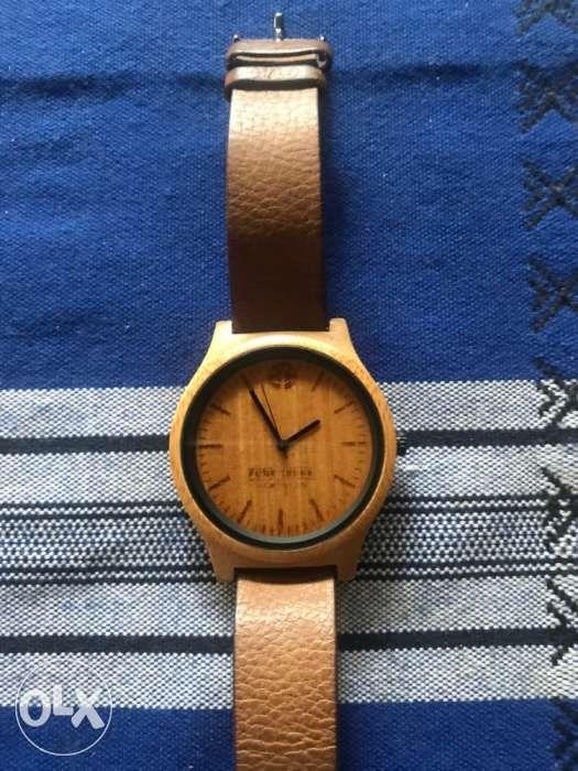 Funk Trunk bamboo watch (Category: Men's Watches) located in Quezon City. Submitted by c.millora (Listing ID 238601073, Image 2). Description: This listing is hosted on Carousell on behalf of OLX Philippines. Funk Trunk bamboo watch with box. Japanese Quartz movement. Leather strap. Looks good for casual wear. Newly replaced batteries. Good condition. Rarely used. Meet ups in QC (UP, Fairview & Trinoma), Mandaluyong (Pioneer) or Manila (La Salle 