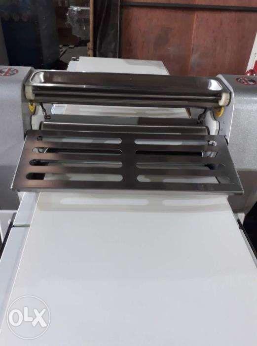 Dough Sheeter (Category: Bakeware) located in Malabon City. Submitted by bunasonny (Listing ID 238816644, Image 3). Description: Model: JDR-520 Power: 0.65kw/single phase Voltage: 220V/60Hz Conveyor belt size: 2160x500mm Roller adjustable gap: 1-40mm Water proof grade: 1P*1mm Roller Width: 520mm Machine Size LxWxH: 5500x880x1180mm Machine Weight: 190kgs We have also table top Php 130,000 Free delivery in Metro Manila Area.. One year service warra