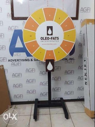 Customized spin wheel with wood and metal stand for corporate game