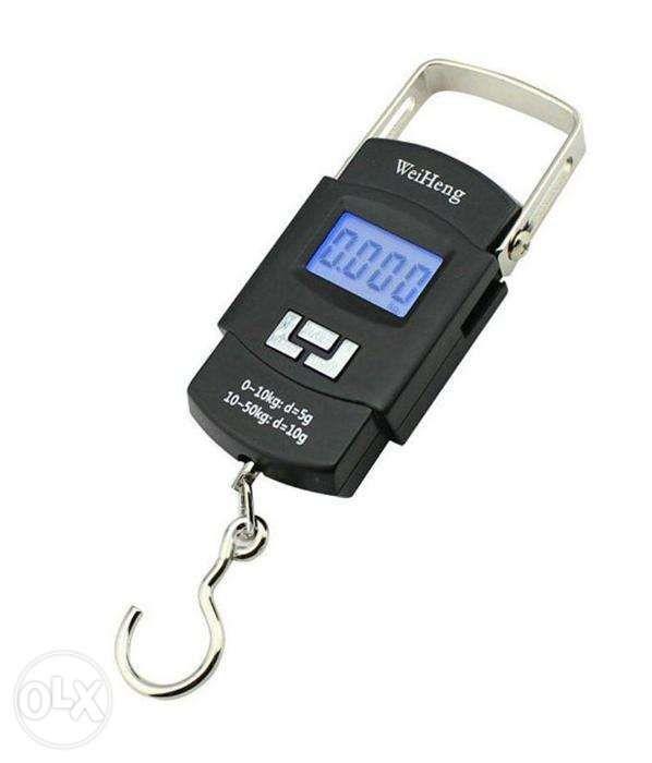 Portable Digital Weighing Weight Electronic Hanging Hook Scale (Category: Home Improvement Tools & Accessories) located in Manila. Submitted by kiconline (Listing ID 238847494, Image 2). Description: FEATURES: - Features an easy to read large LCD blue backup light displays weight in kgs/lbs and combines tare data lock functions. It has a accuracy of 10gm with multiple weighing units in kg/lb/oz. It can hold automatic reading and indicates over lo