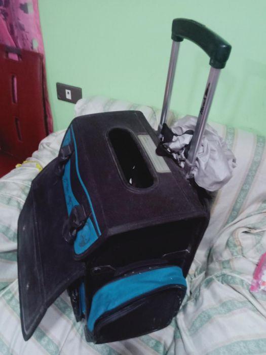 Original Hawk trolley bag (Category: Diaper Bags & Wetbags) located in Manila. Submitted by inaydearest (Listing ID 238890591, Image 3). Description: Original Hawk trolley school bag. Color Black and blue ( as seen in the picture) With four side pockets . Height = 16.5 inches and length= 14 inches and width=8.5 inches. Still in good condition especially the wheels and the handle. With plastic cover for rain protection Negotiable price..