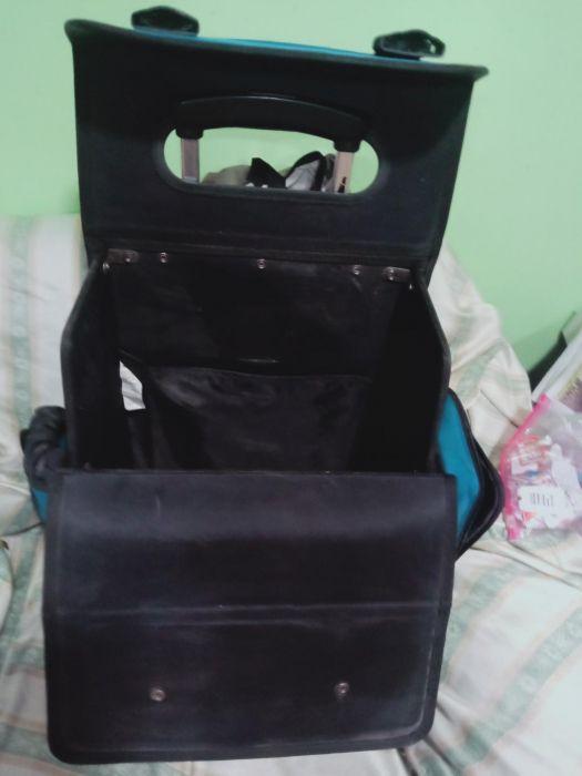 Original Hawk trolley bag (Category: Diaper Bags & Wetbags) located in Manila. Submitted by inaydearest (Listing ID 238890591, Image 2). Description: Original Hawk trolley school bag. Color Black and blue ( as seen in the picture) With four side pockets . Height = 16.5 inches and length= 14 inches and width=8.5 inches. Still in good condition especially the wheels and the handle. With plastic cover for rain protection Negotiable price..