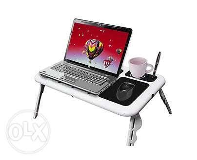 Laptop Cooler Desk (Category: Laptops & Notebooks) located in Manila. Submitted by magicgerry (Listing ID 238905811, Image 2). Description: Adjustable Portable Laptop Table Cooler Desk (P539.00) Highlights: > Adjustable Portable Laptop Cooler Desk > High quality > Easy to carry > With adjustable legs for your preference and comfort > Its structure is suitable for any laptop size > Includes a fan that provides cooling to the laptop > Maximum Load:
