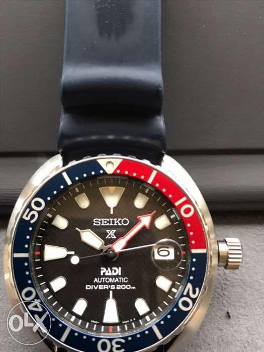 Seiko PADI Mini Turtle (Category: Men's Watches) located in Santa Rosa. Submitted by daryl.daryl2 (Listing ID 239164455, Image 2). Description: This listing is hosted on Carousell on behalf of OLX Philippines. Selling my Seiko Prospex PADI Mini Turtle in silicone rubber strap. Bought in September 2018. This comes with a very unique wave pattern on the dial, not found in any turtle releases. Sized perfect for those who have medium wrists. Original
