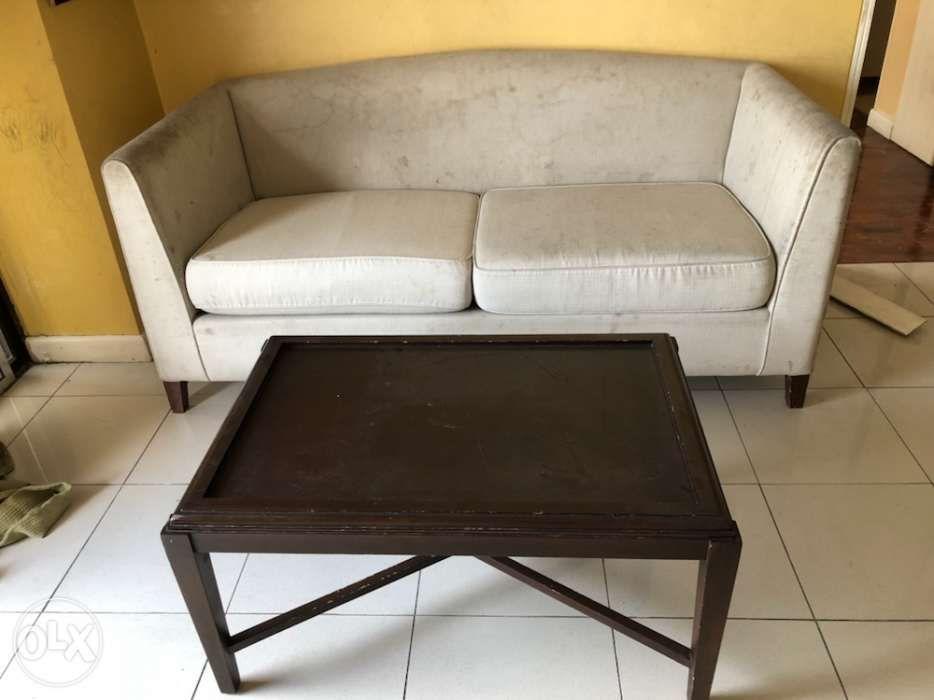 solid wood center table and sofa (Category: Sofas) located in Quezon City. Submitted by nette68 (Listing ID 239171425, Image 2). Description: Mahogany wood center table Sofa (needs to be reupholstered or cleaned).