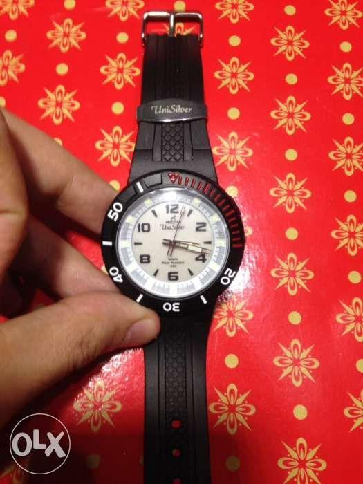 UNISilver ORIGINAL wrist watch (Category: Men's Watches) located in Makati City. Submitted by spriteblue (Listing ID 239172192, Image 3). Description: fixed price , repriced already last price inquiry will be ignored. Selling unisilver mens watch brandnew May plastic covering pa ang glass Glow in the dark hour hands it has cool ice blue Led light for night time read Included: Warranty card box unisilver Muntinlupa alabang meet up weekdays. Pwede 