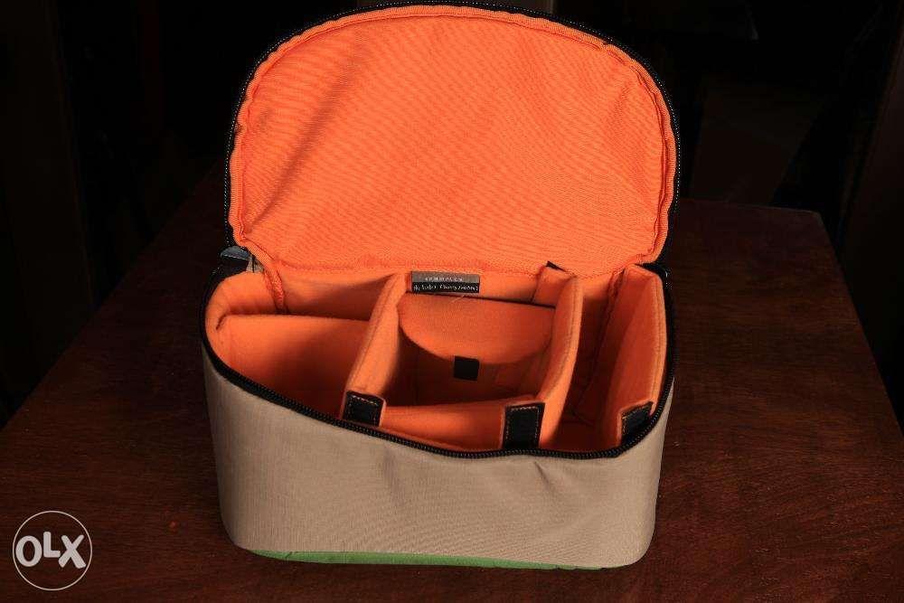 Crumpler bucket Barney (Category: Camera Bags & Carriers) located in Manila. Submitted by belletsy (Listing ID 239177824, Image 2). Description: Material Exterior: Water resistant 420 denier Ripstop Nylon shell Interior: Brushed Nylon lined main compartment Interior: Fully padded Type of Closure Double sided zipper Exterior Dimensions 13.78 x 7.48 x 7.48" (35 x 19 x 19 cm) (WxHxD) Volume Interior: 427.17 cubic inch (7.0 cubic liters).